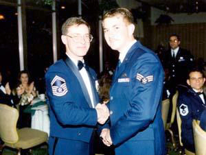 John Temple, right, in his dress blues at an Air Force function.