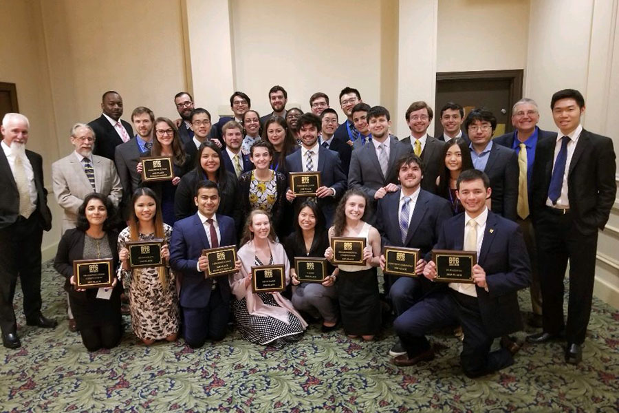 ASCE Chapter members display their awards after the Carolinas Conference banquet. The chapter won first place overall as well as first place in the hydraulics, transportation and environmental competitions. (Photo: Sam Dennard)