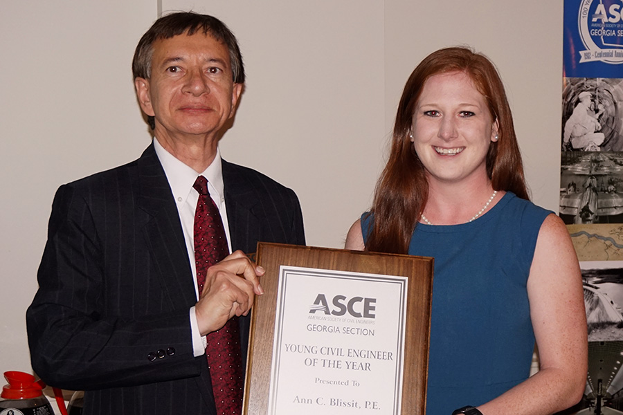 Annie Blissit, right, accepts the Young Civil Engineer of the Year Award from American Society of Civil Engineers Georgia Section President Shaukat Syed. (Photo Courtesy: John Pierson)