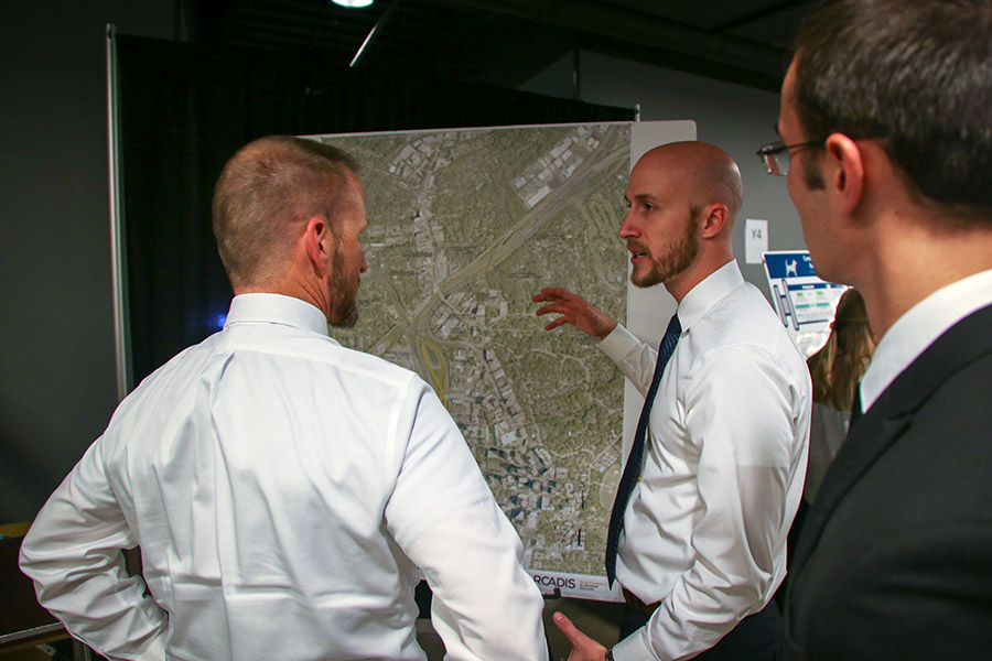 Ashton Austin and Alex Herdt talk about their ideas for improving the Brookwood split — where interstates 75 and 85 diverge north of Atlanta. The team worked to ease congestion in the area and ultimately offered a combination of changes — all still within the existing right of way — that would significantly reduce crashes and save drivers' a total of 3,100 hours daily. (Photo: Amelia Neumeister)