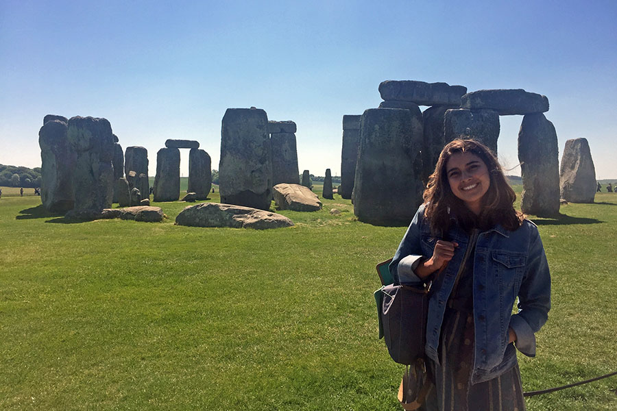 Civil engineering undergraduate Brittney Vidal stands in front of Stonehenge in England, one of the many sites she visited during her study abroad semester in London. Vidal said she realized she wanted to dedicate her career to structural engineering while lying in the grass and marveling at the famous stone structure. (Photo: Diana Chumak)