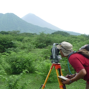 Andrew Loo surveying land